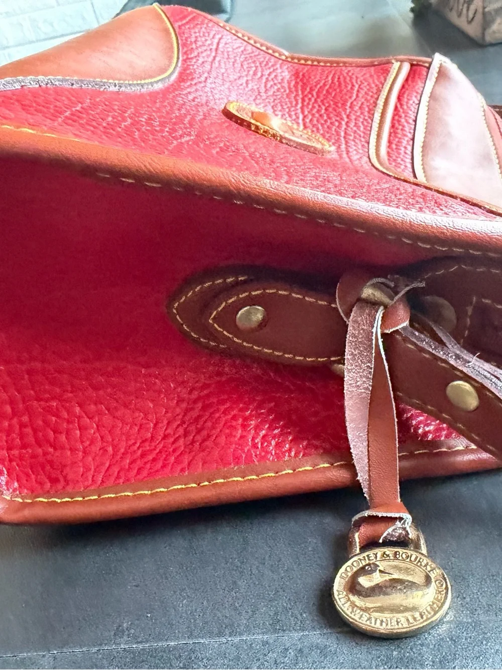 Dooney & Bourke Red Pebbled Leather Shoulder Bag with Brown Trim